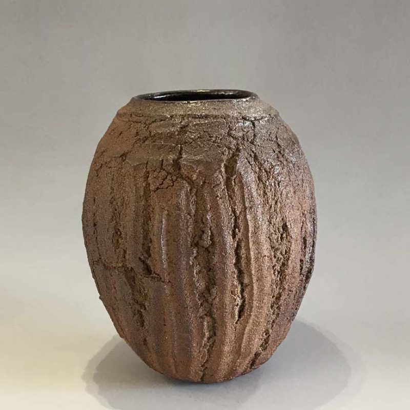 Patricia Shone 17. Erosion Vase, Hand formed crank clay, wood-fired stoneware with tenmoku glaze interior h19 cm.